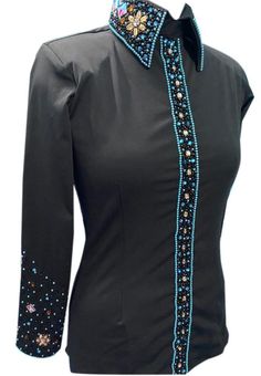 a women's black shirt with blue and gold beading on the collarline