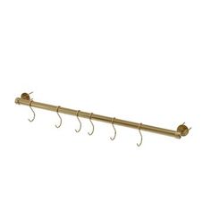 a gold coat rack with five hooks and two fish hooks hanging from the side, on a white background