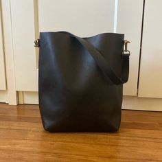 Nwot Unused, Perfect Condition Transport Bucket Bag. Perfect Size, Beautiful Quality Black Leather. Comes With Additional Strap For Longer Length. Currently On Madewell Site For $168 Leather. Magnetic Closure. Interior Pocket. 9.5" Leather Shoulder Drop. 17" (At Longest) Leather Crossbody Drop. 12"H X 8"W X 4"D. Imported. Item Nm952 Madewell Bags, Bucket Tote, Magnetic Closure, Leather Crossbody, Bucket Bag, Madewell, Black Leather, Bag Lady, Tote Bag