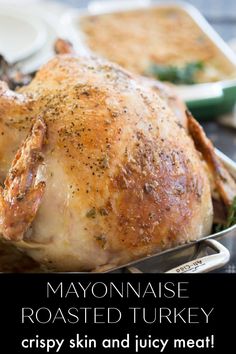 a close up of a turkey in a pan with the words mayonnaise roasted turkey crispy skin and juicy meat