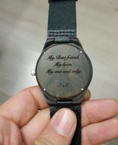 a person holding up a watch with the words, my dear friend, my brothers, my one and only on it