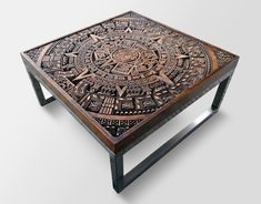 a wooden table with an intricate design on it