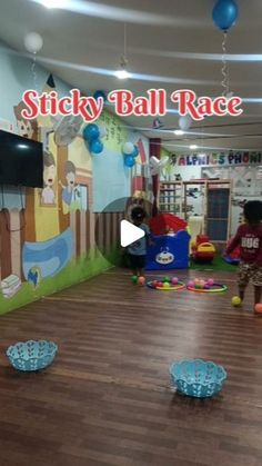 the children are playing with their toys in the playroom at sticky ball race, which is open for business