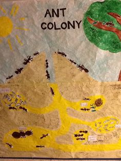 a child's artwork depicting an ant colony and a tree in the background with words written on it