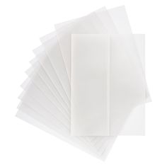 six sheets of white paper stacked on top of each other