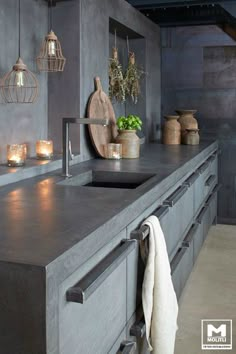 a kitchen counter with candles on it and an instagramr above the counter top