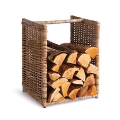 a stack of logs in a wicker basket