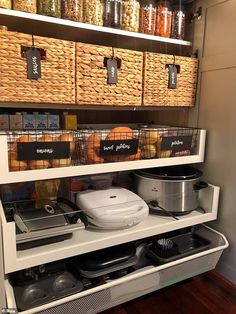 an organized pantry with baskets and food items