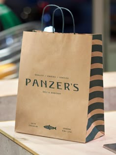 a brown paper bag sitting on top of a counter