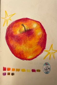 an apple drawn in colored pencils on a piece of paper with stars around it