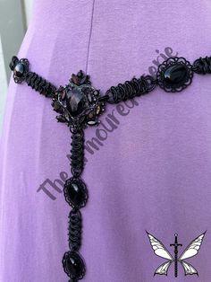 "Here at The Armoured Faerie we take unique, vintage, and costume jewelry parts, belts, and connectors then combine them with hand woven maille. This allows us to craft custom and often one-of-a-kind pieces we like to call Reincarnations. Please message us to ensure proper size and fit BEFORE ordering. Our girdles often can NOT be clasped smaller than listed and require physical adjustments. This amazing girdle is woven by hand with maille \" Vertebrae\" units.  Multiple jewelry belts were disassembled and cleaned. Then re-integrated into this design. This would make a beautiful addition to your court gown. Or, a stunning statement piece to start your new garb concept. Photos taken on multiple backgrounds to show the color changing characteristics of the connectors and rings.  Waist: 38\" Court Gown, Fantasy High, Girdles, Concept Photos, Suspender Belt, Unique Vintage, Costume Jewelry, Hand Woven, Statement Pieces