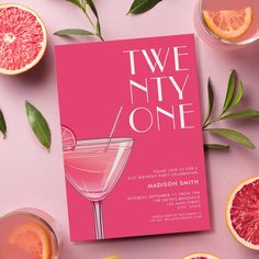 a pink cocktail party card with grapefruits and orange slices on the table