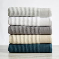 folded towels stacked on top of each other