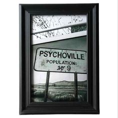 a black and white photo of a sign that says psychsville population