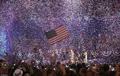 an american flag is in the middle of confetti