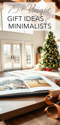 an open book on top of a wooden table with a christmas tree in the background