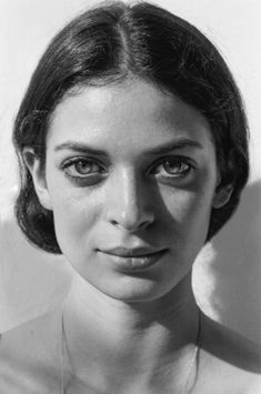 black and white photograph of a woman with large eyes