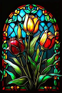 a stained glass window with three flowers in it