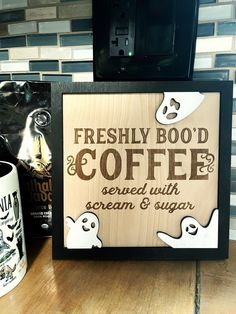 a sign that says freshly bood coffee served with scream and sugar