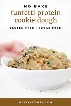 no bake funfetti protein cookie dough in a white bowl with sprinkles