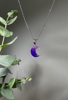 Magical Moon Phase Necklace, Magical Moon Phase Necklace With Round Pendant, Purple Moon Shaped Spiritual Jewelry, Spiritual Purple Moon Shaped Jewelry, Spiritual Purple Moon-shaped Jewelry, Mystical Moon Shaped Necklace Gift, Magical Moon Phase Pendant Necklace, Mystical Moon Shaped Necklace For Gifts, Mystical Resin Necklaces For Gifts