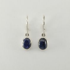 This is a  beautiful pair of Blue Kyanite Earrings in 925 Sterling Silver. They are made out of Sterling Silver with no nickel so there should be no allergic reaction and nothing will turn green. The silver is not only silver plated or steel but solid 925 Sterling Silver. We usually ship the same day in a nice gift box. Classic Oval Earrings With Ear Wire, Blue Oval Hallmarked Earrings, Classic Blue Earrings For Everyday, Oval Sapphire Nickel-free Jewelry, Nickel-free Oval Sapphire Jewelry, Oval Sterling Silver Earrings With Polished Finish, Oval Sapphire Earrings Hallmarked, Blue Sterling Silver Earrings With Polished Finish, Blue Oval Cabochon Earrings As Gift