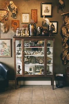 a display case in the corner of a room