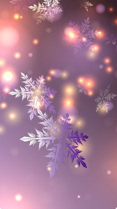 snowflakes are floating in the air on a purple background