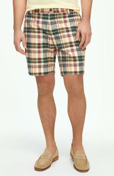 Soft cotton madras woven in a bright plaid brings sunny-day comfort to shorts styled with a classic flat front and a relaxed, all-occasion feel. 7" inseam; 20" leg opening; 11" front rise; 15" back rise (size 32) Zip fly with button closure Front slant pockets; back button-welt pockets 100% cotton Dry clean or machine wash, tumble dry Imported Plaid Cotton Shorts For Daywear, Casual Plaid Cotton Shorts, Summer Plaid Cotton Bottoms, Casual Plaid Bottoms With Built-in Shorts, Plaid Cotton Beach Bottoms, Casual Plaid Shorts For Spring, Casual Plaid Shorts, Preppy Plaid Bottoms For Summer, Preppy Plaid Cotton Shorts