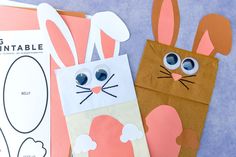 paper bag with bunny ears and eyes on it next to an easter bunny cutout