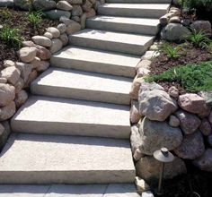 stone steps leading up to the top of a hill