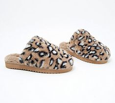 For days spent padding around the house or a quiet morning sipping coffee on the patio, these soft and fluffy slippers are the perfect complement to a cozy pair of pajamas topped with a robe.  All I want for Christmas is... Give the gift of comfort and warmth this holiday season. A faux fur lining covers the cushioned insoles, so the recipient of this practical (yet stylish!) present will feel like they're walking on a cloud. From Koolaburra by UGG. Mens Suede Slippers, Leopard Mules, Quiet Morning, Sipping Coffee, Fluffy Slippers, Koolaburra By Ugg, Suede Slippers, Men Suede, All I Want For Christmas