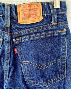 "S p e c i f i c s . . . Label: Levi's Student Fit Tagged Size: 27 x 31 Approx Fit: XS - S Color: Blue // Bronze Hardware // Red Tab Material: Denim // Brass Hardware Condition: Overall in Amazing Vintage Condition (No seen flaws, perfect for someone to break in) M e a s u r e m e n t s . . . (side to side // laying flat // closed) Waist - approx 13.5\" Hips - approx up to 17\" Length - approx 40.5\"" Cheap Levi's Men's Tops, Cheap Levi's Tops With Button Closure, Cheap Blue Levi's Bottoms, Cheap Blue Levi's Pants, Slim Vintage Blue Jeans, Cheap Levi's Denim Bottoms, Cheap Vintage Levi's Tops, Levi Jeans For Sale, 720 Levis Jeans