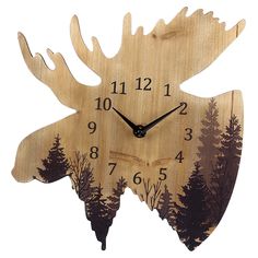 a wooden clock with an image of a moose's head and trees on it