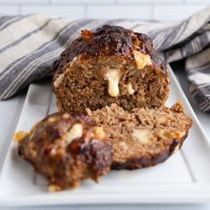 meatloaf on a plate with one cut in half