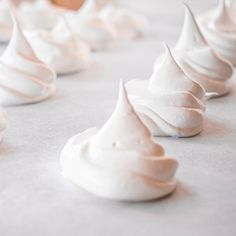 some white icing sitting on top of a table