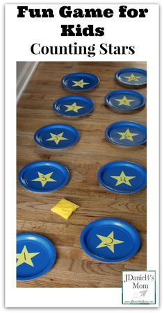 some blue plates with yellow stars on them and the words fun game for kids counting stars