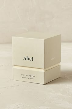 an empty white box sitting on top of a table