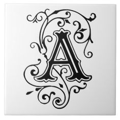 a monogrammed stone coaster with the letter a in black on a white background