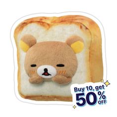 a close up of a toast with a stuffed animal on it's face and the words buy 10 get 50 % off