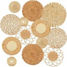 wicker circles are arranged on the floor for art work or wall hangings in various sizes and colors