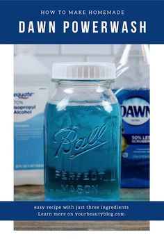 a blue mason jar with the words how to make homemade dawn powerwash