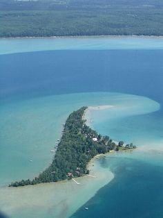 an island in the middle of some water