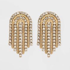 Add a little edge and sparkle to every ensemble with the SUGARFIX by BaubleBar Crystal and Gold Arch Statement Earrings. These statement earrings feature on trend curtain fringe crafted from gold hardware, and are dotted with dainty crystals for extra shine. With its unique shape and sleek movement, we're sure you'll wear this pair for many occasions. Disco Outfits, Gold Rhinestone Earrings, Pageant Outfits, Crystal Statement Earrings, Glowforge Projects, Beige Fashion, Baublebar Earrings, Baddie Vibes, Rhinestone Fringe