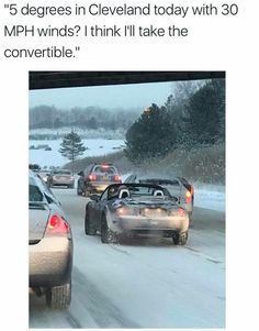 there are many cars driving down the road in the snow, and one is saying it's 5 degrees today with 25mph winds i think i'll take my convertible