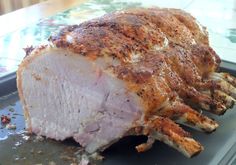 a roasting ham is sitting on a platter