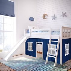 a child's bedroom with a bunk bed and slide