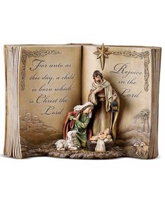 an open book with a nativity scene inside