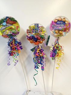 three candy lollipops on top of each other