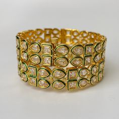 Gold plated Kundan openable Kada Bangles Pair/Indian Kada/Wedding Jewelry/Kada Bang/les/Punjabi Jewelry/Indian Wedding/Bollywood bangles Made from High Quality Hand Picked Kundan Stone Perfect Kundan bangles for Party Wear. The Look Is Stunning And Preciously Suitable For All Kinds Of Dressy Occasions Its a Ideal Gift for Your Loved ones, Wife, Mother, Sister, Friend, Excellent gift for Birthday, Anniversary, Wedding , Can be wear any party , wedding, Festivals and Celebrations etc. This is 100% Bollywood Heavy Bangle For Festive Occasions, Green Tilla Bangle In Bollywood Style, Heavy Bracelets For Diwali Party, Green Bollywood Bangle With Tilla Detail, Green Bollywood Bracelet For Diwali, Heavy Green Kundan Bracelets, Green Bollywood Bracelets For Diwali, Green Tilla Bollywood Bangle, Bollywood Meenakari Bangle